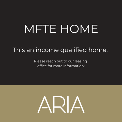 an image of mite home logo with black and brown background